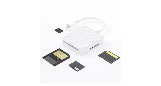 Universal card reader with SmartMedia-style cards on a white background